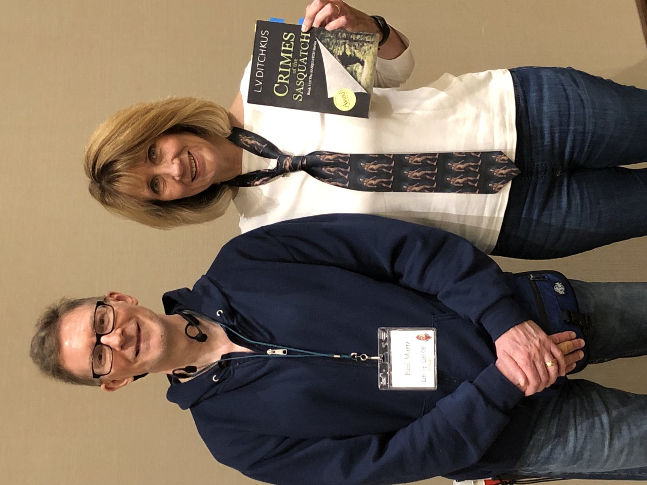 Image of Paul and Linda. Linda holds her Crimes of the Sasquatch book.