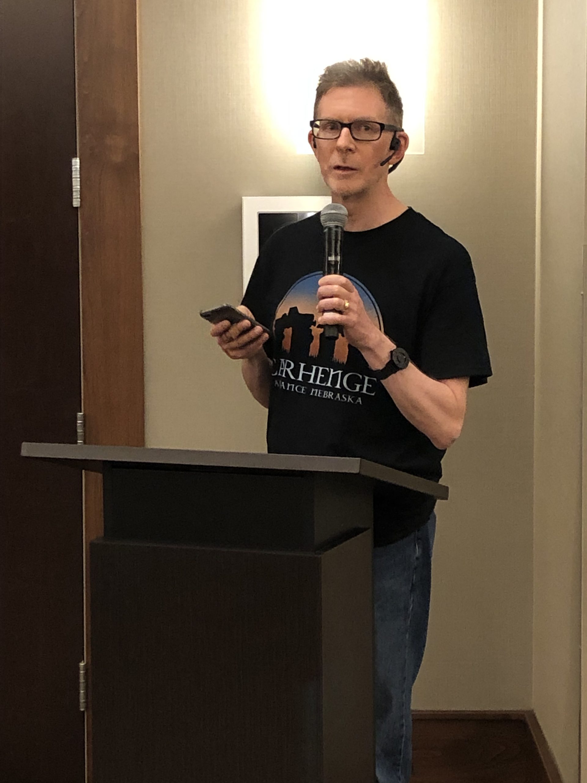 Image of Paul reading live at the open mic event.